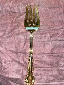 Vintage Oneida Community, gold electroplate, gold Beethoven  Cold Meat Fork - Picture 1 of 3