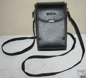 Estuche de almacenamiento y correa para el hombro rígido/lente duro Sigma NC-70 - Imagen 1 de 7