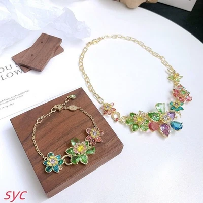 New In Box Idyllia necklace bracelet mixed cut, floral, shimmering, gold-plated - Image 1 of 4