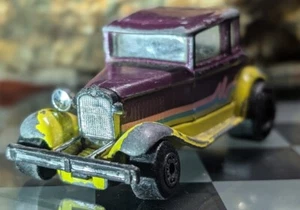 Vintage Matchbox Model A Ford - 1979 Thailand - Purple And Yellow - Blue Stripe - Picture 1 of 7