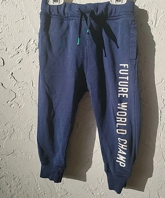 Pantalones deportivos azules H&M niño 2-3 años futuro campeón del mundo gráfico cordón  Foto 1 de 4