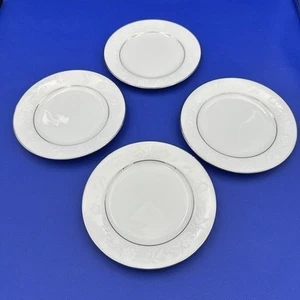 "Juego de 4 platos de pan Noritake Ranier 6909 6 3/8"" blanco floral sobre borde blanco plateado" - Imagen 1 de 9