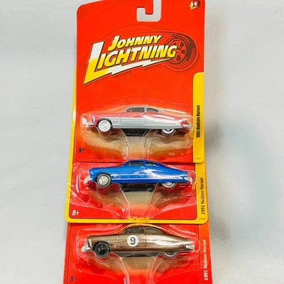 Johhny Lightning Lot of 3 1951 Hudson Hornets: Red/Gray, Blue and Brown #9 - Image 1 of 4