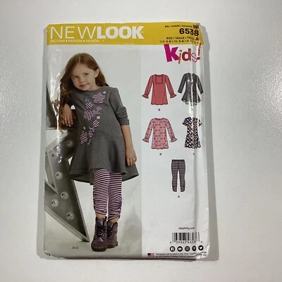 New Look Sewing Pattern 6538 Girls Knit Leggings & Dresses Sizes 3-8 - image 1 of 4