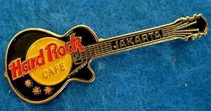 GUITARRA JAKARTA NEGRA GIBSON LES PAUL HI TAI PEBBLE BACK Hard Rock Café PIN - Imagen 1 de 1