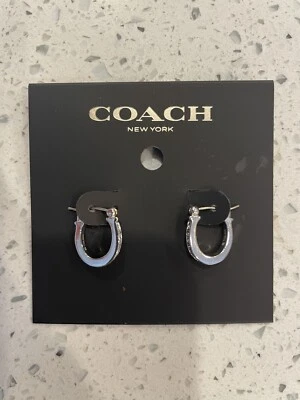 Pendientes Coach de plata ovalados Foto 1 de 4