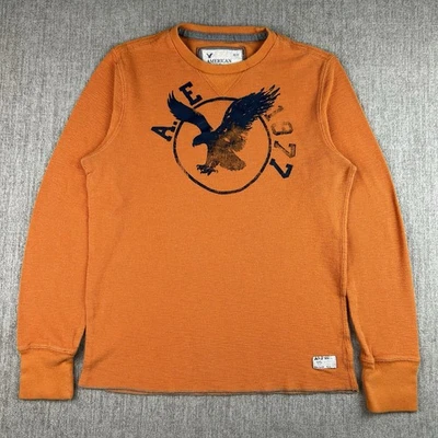 Camisa térmica de manga larga naranja American Eagle para hombre con logotipo de M Eagle ajuste deportivo Foto 1 de 4