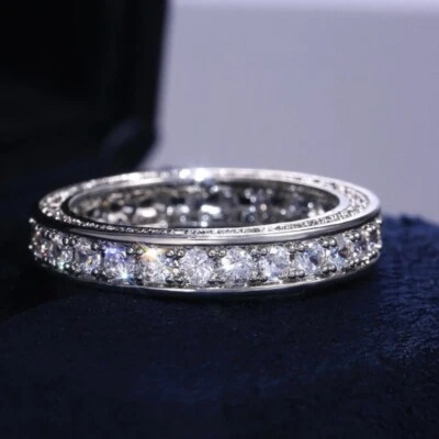 Banda de anillo de circonita cúbica de eternidad completa, anillo brillante de declaración de cristal plateado Foto 1 de 4