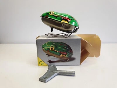 Jouet en tôle grenouille sauteuse - Photo 1/4