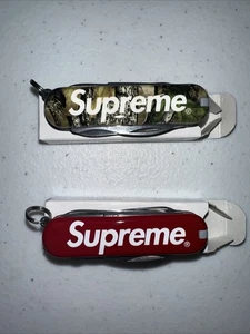 Supreme - Victorinox - Pocket Knife - Red & Camouflage - SS25 Lot Of 2 New DS - Picture 1 of 3