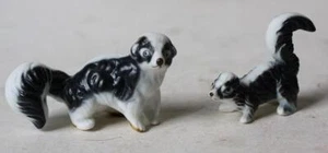 Skunk Figurines Miniature Tiny Set of 2 Mommy Baby Skunks Bone China Unmarked -- - Picture 1 of 1
