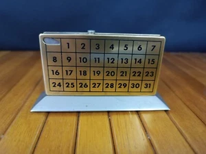 RARE VINTAGE TABLE LIGHTER WITH MONTHLY CALENDAR - Picture 1 of 4
