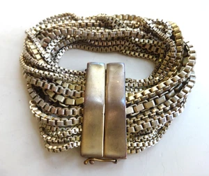 BRACCIALE VINTAGE ANNE KLEIN NEW YORK MULTI CATENA LARGO BRACCIALE GROSSO TONO ORO MAGNETICO - Foto 1 di 11