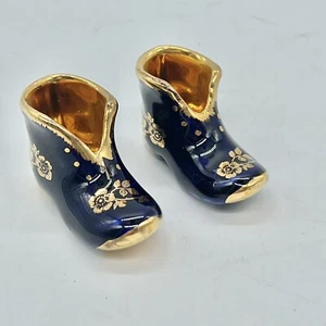 Mini zapatos holandeses de porcelana vintage Limoges Francia aprox 2" - Imagen 1 de 6
