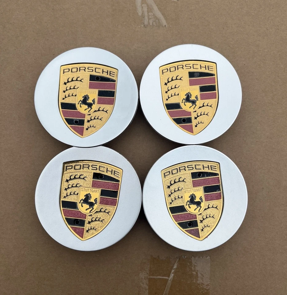 Juego de 4 tapas centrales para llantas Porsche plateadas y doradas 76 mm 7L5601149 7P5601149 Foto 1 de 4