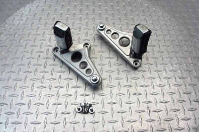 Par de soportes de estriberas traseras para pasajero Honda Magna 700 VF700 1986 85 86 OEM Foto 1 de 4