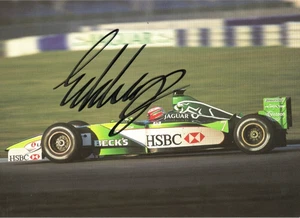 FORMULA ONE: EDDIE IRVINE SIGNED JAGUAR 6x4.5 ACTION PROMO/PHOTO+COA - Picture 1 of 1