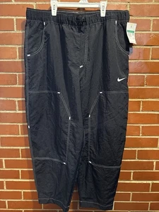 Pantaloni Nike nuovi con etichette taglia XL abbigliamento sportivo Swoosh stile pista larghi vita alta - Foto 1 di 7