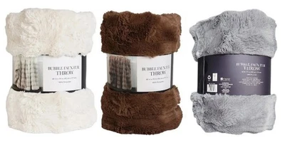 Tiro de piel sintética burbuja Costco, tiro de poliéster lavable a máquina de 60" x 70" Foto 1 de 4