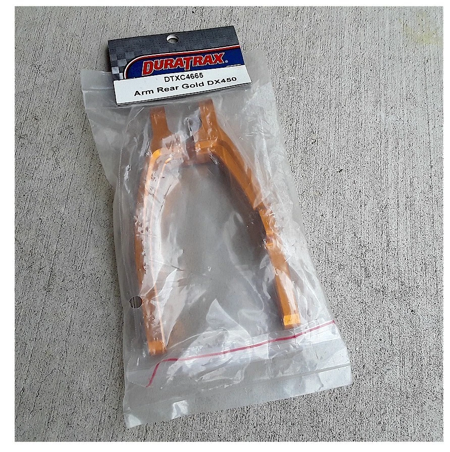 Vintage RC Duratrax DTXC4665 Arm Rear Gold Aluminum DX450 Motorcycle Old Stock - Image 1 of 1