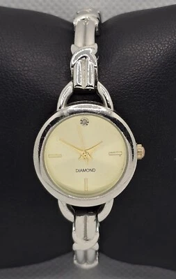 Women's Classic Dress Diamond Round Champagne Dial Silver Tone Bangle Watch 04 - image 1 of 4