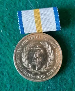 DDR Medal Of Loyal Service In Health And Social Welfare. Gold Level - Picture 1 of 2
