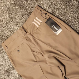 Pantaloni da golf Adidas uomo 32 x 38 Climalite kaki extra lunghi pieghettati elasticizzati nuovi con etichette - Foto 1 di 7
