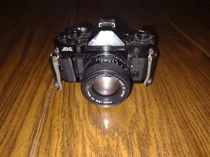 Canon A-1 35mm Film camera Black body New FD 50mm f1.4 Lens MADE IN JAPAN - Picture 1 of 4