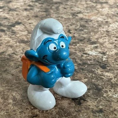 Figura de PVC de juguete mochila naranja Pitufo 20103 vintage Foto 1 de 4