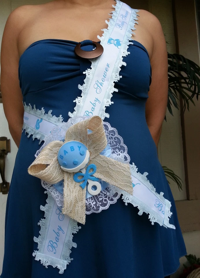 Baby Shower Mom To Be It's a Boy Sash Blue With Rattle, Ribbon and Corsage  - Image 1 of 1