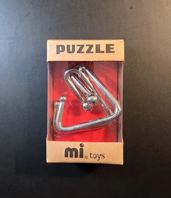 mi toys brain teaser puzzle • consists of two stainless steel triangles • NEW - Image 1 of 4