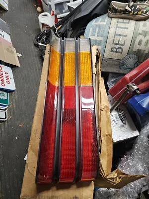 79 / 83 DODGE OMNI 024 левый проход боковой задний фонарь OEM новый из старых запасов! Редкий  - Изображение 1 из 4