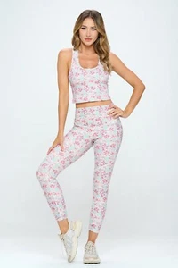 Set atletico evoluzione e creazione crop top racerback leggings neve giardino floreale - Foto 1 di 20