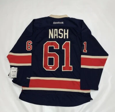 CAMISETA DEL 85 ANIVERSARIO FIRMADA POR RICK NASH DE LOS NEW YORK RANGERS CERTIFICADO DE AUTENTICIDAD JSA Foto 1 de 3