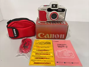 Canon Sure Shot WP-1 fotocamera pellicola 35 mm con cinturino, custodia, scatola, scatola aperta completamente testata - Foto 1 di 11