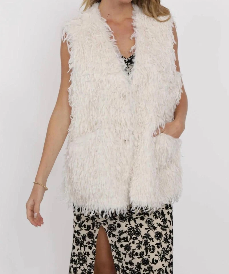 Chaleco largo de piel con flecos Sage The Label Trailblazer blanco Foto 1 de 1