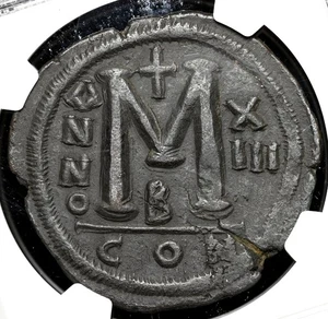BIZANTINO. Justiniano I, d.C. 527-565. Æ Follis, Constantinopla, NGC VF - Imagen 1 de 4