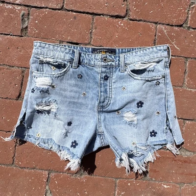 USADO EN EXCELENTE ESTADO LUCKY BRAND PANTALONES CORTOS VAQUEROS DE MEZCLILLA PARA MUJER 26 FLORES BORDADAS BOHO Foto 1 de 4