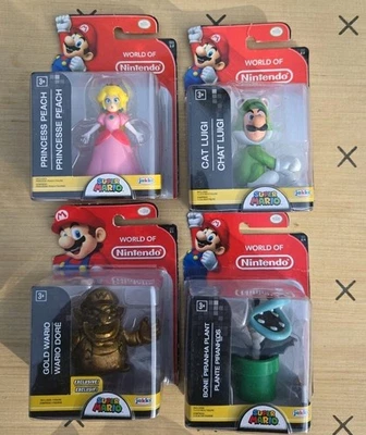 LOTE de 4 World of Nintendo Jakks Super Mario 2.5": Peach Cat Luigi DORADO Wario + Foto 1 de 4