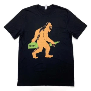 Bella + Lona Para Hombre Botella de Cerveza Grande Pie Gráfico Camiseta Divertida Negra Algodón - Imagen 1 de 8