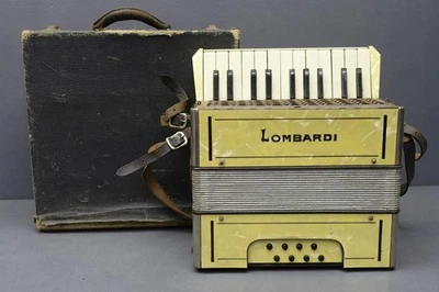 Желтый фортепианный аккордеон Hohner LOMBARDI Германия стальные тростники 8 бас/22 высокие частоты - Изображение 1 из 4