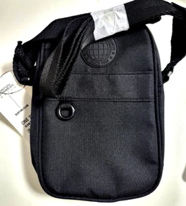 Bolso Bandolera Lateral Burton Para Hombre Negro Diseñado para The Elements 1904 Viaje - Imagen 1 de 3