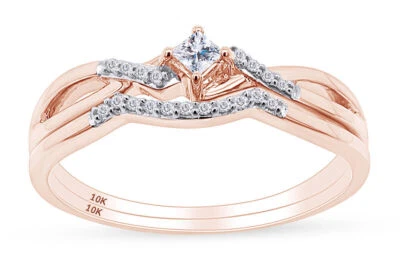 Juego de anillos de compromiso de boda de diamantes naturales de 1/5 quilate de oro rosa de 10 quilates Foto 1 de 4