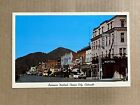 Postcard Canon City CO Main Street Business District Hotel Canon Rex Theater