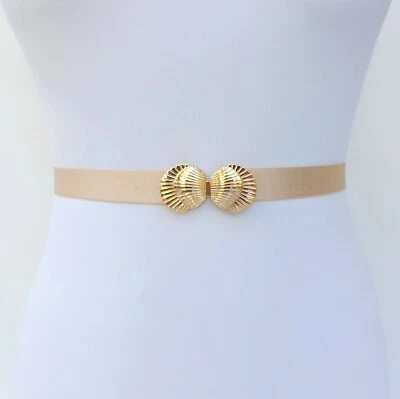 Cinturón elástico champán con cierre de conchas doradas para mujer Foto 1 de 4