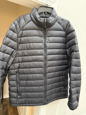 Chaqueta ligera acolchada negra azul marino Heat Keep para hombre empaquetable Foto 1 de 4