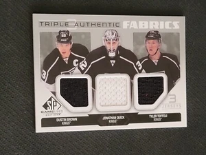 2014-15 UD SP GAME USED DUSTIN BROWN JONATHAN QUICK TYLER TOFFOLI AF3-LAK JERSEY - Picture 1 of 2