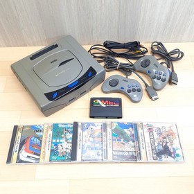 Sega Saturn Japanese Gray console with 2 controllers, 5 games & memory tested