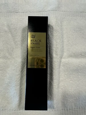 Tónico reparador de caracoles negros Holika Holika 3,38 fl oz - líquido hidratante #8867 Foto 1 de 2