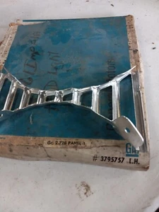 NOS GM # 3795757 61 IMPALA GRILLE EXTENSION LH HEADLIGHT DIVIDER - Picture 1 of 2